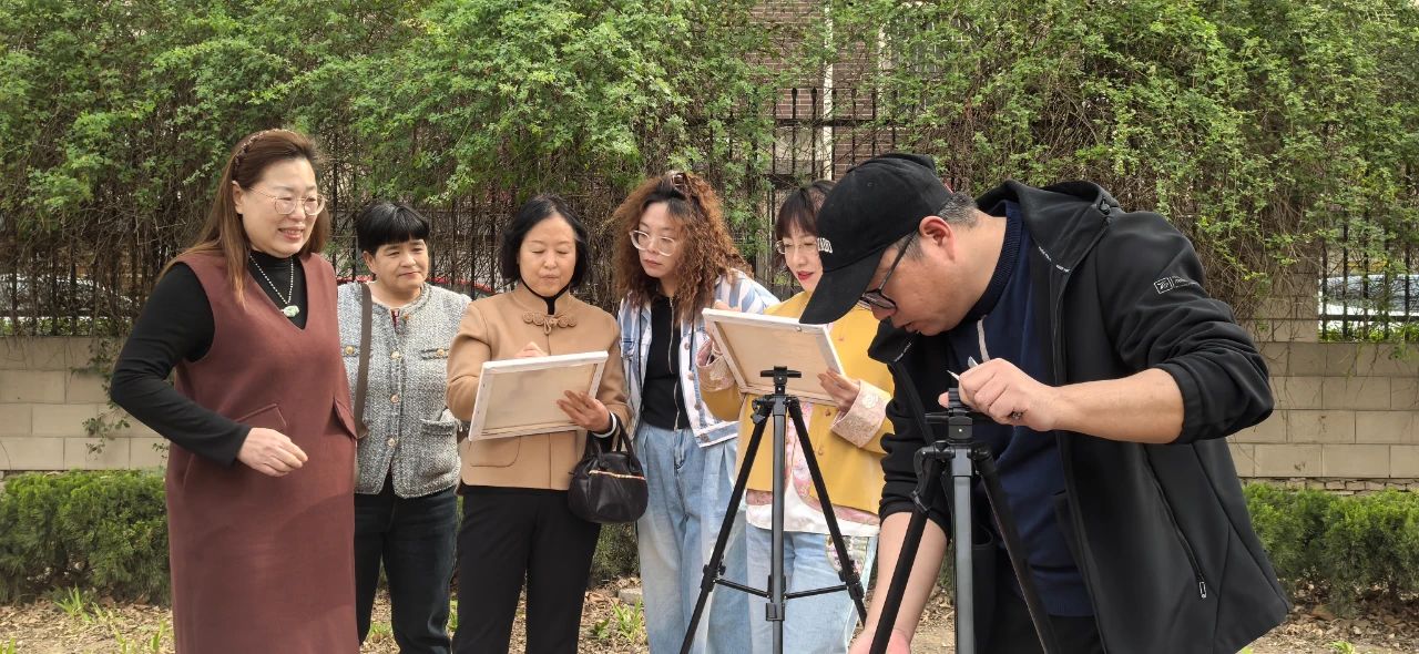 市文化馆手机短视频拍摄团队,走进“樱花大道”实地采风创作