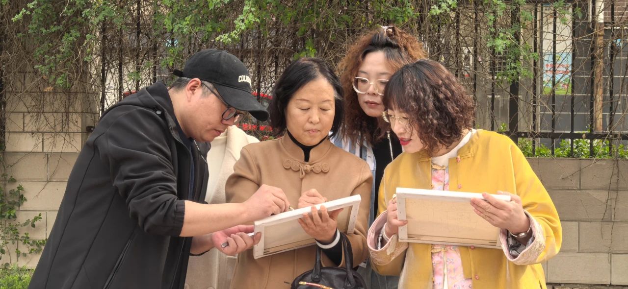 市文化馆手机短视频拍摄团队,走进“樱花大道”实地采风创作